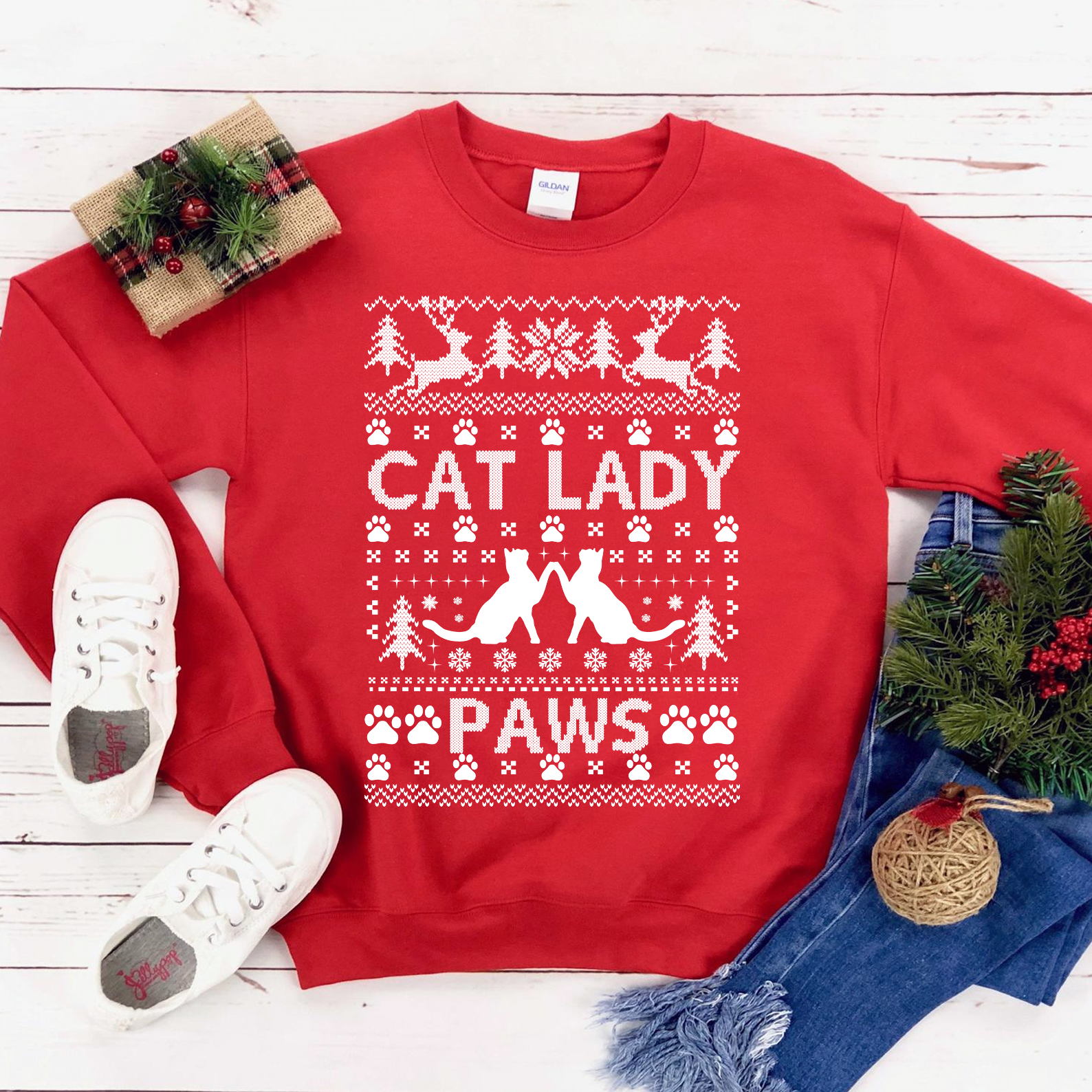 A cozy Cat Lady Christmas Sweatshirt featuring a festive design, perfect for cat lovers during the holiday season.