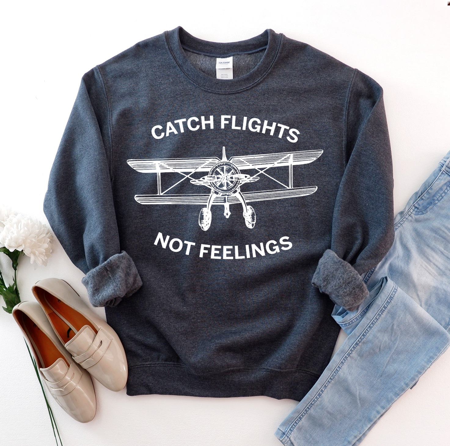 Catch Flights Not Feelings Sweatshirt in a stylish unisex design, showcasing its soft fabric and comfortable fit.