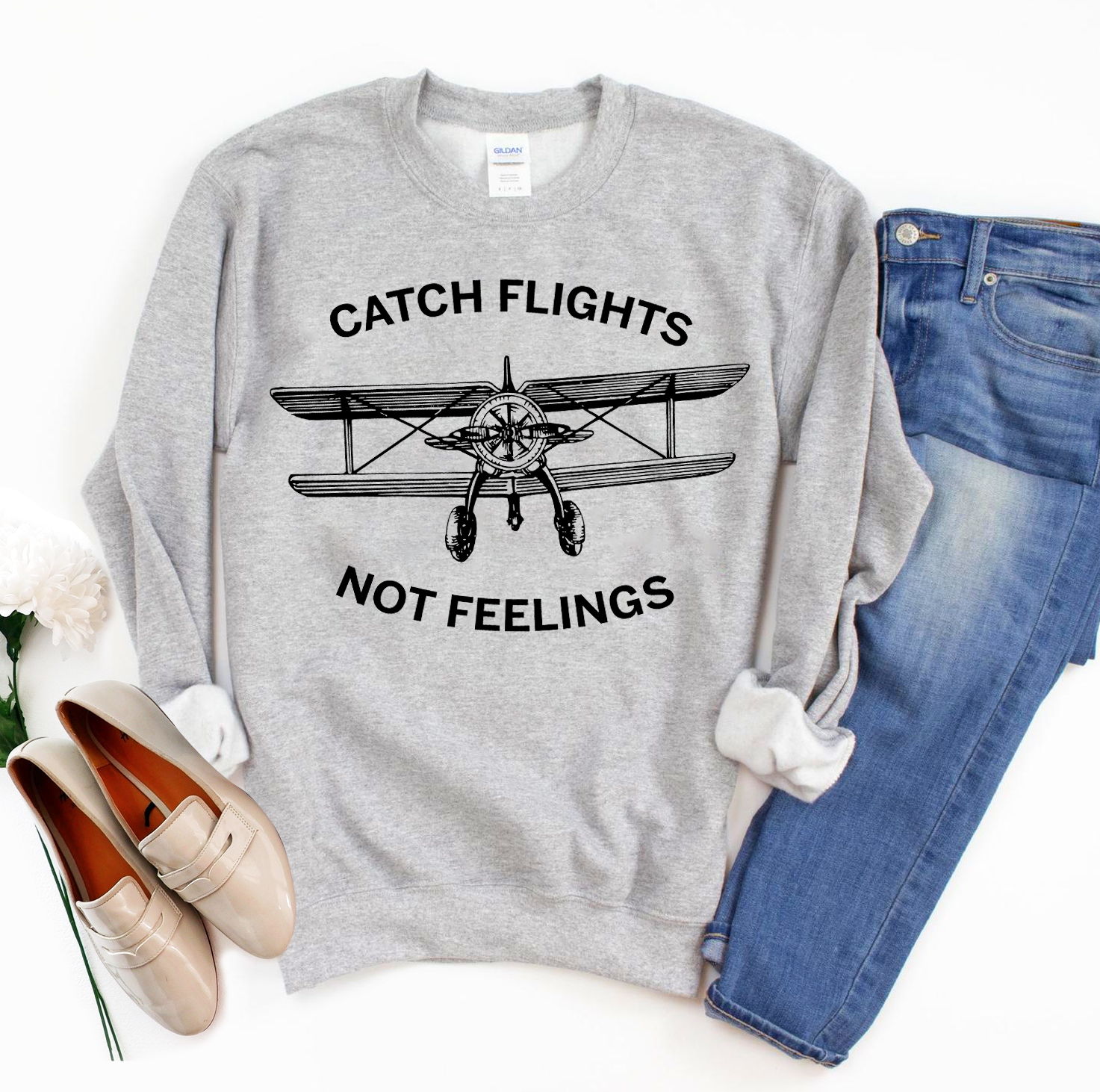 Catch Flights Not Feelings Sweatshirt in a stylish unisex design, showcasing its soft fabric and comfortable fit.