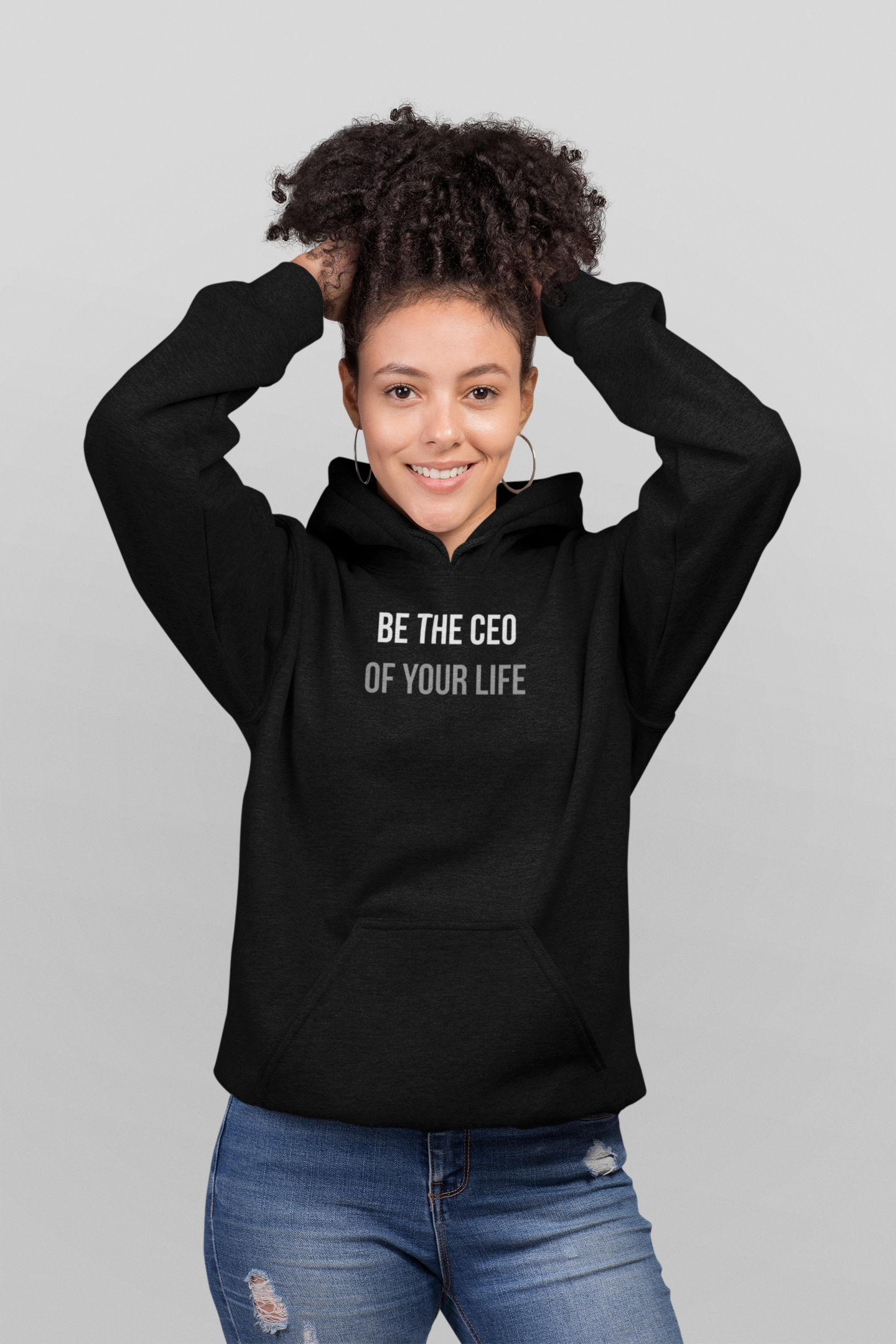 A stylish women’s hoodie featuring the phrase 'CEO of Your Life', made from a cozy cotton/poly fleece blend, showcasing an adjustable hood and banded cuffs.