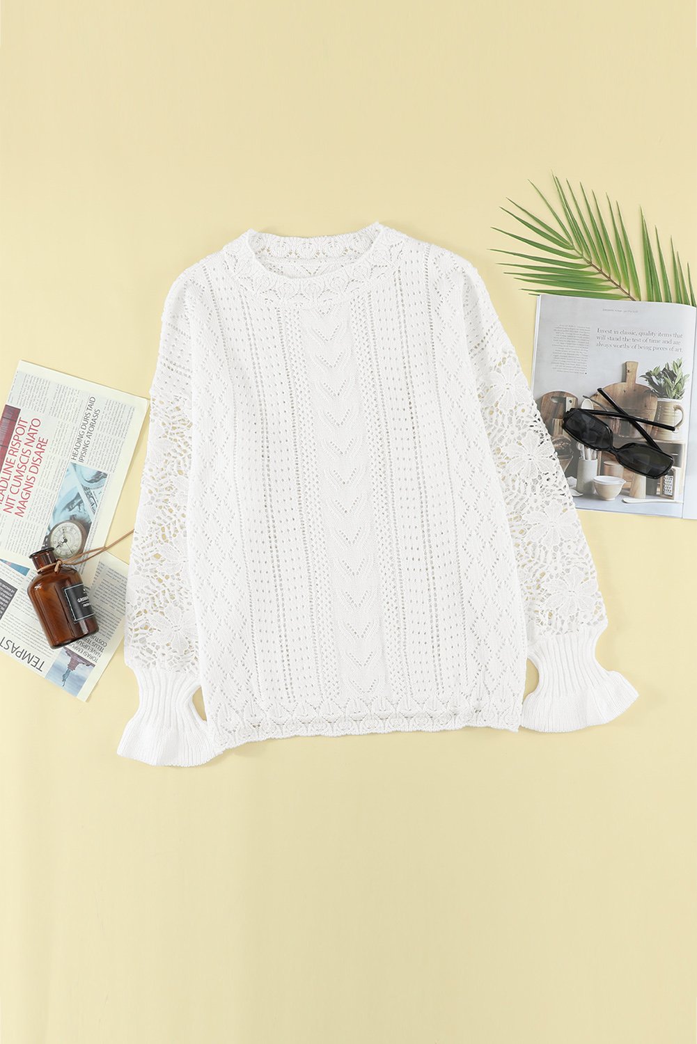 Chic White Crochet Lace Pointelle Knit Sweater featuring scalloped neckline and lace sleeves, perfect for winter fashion.