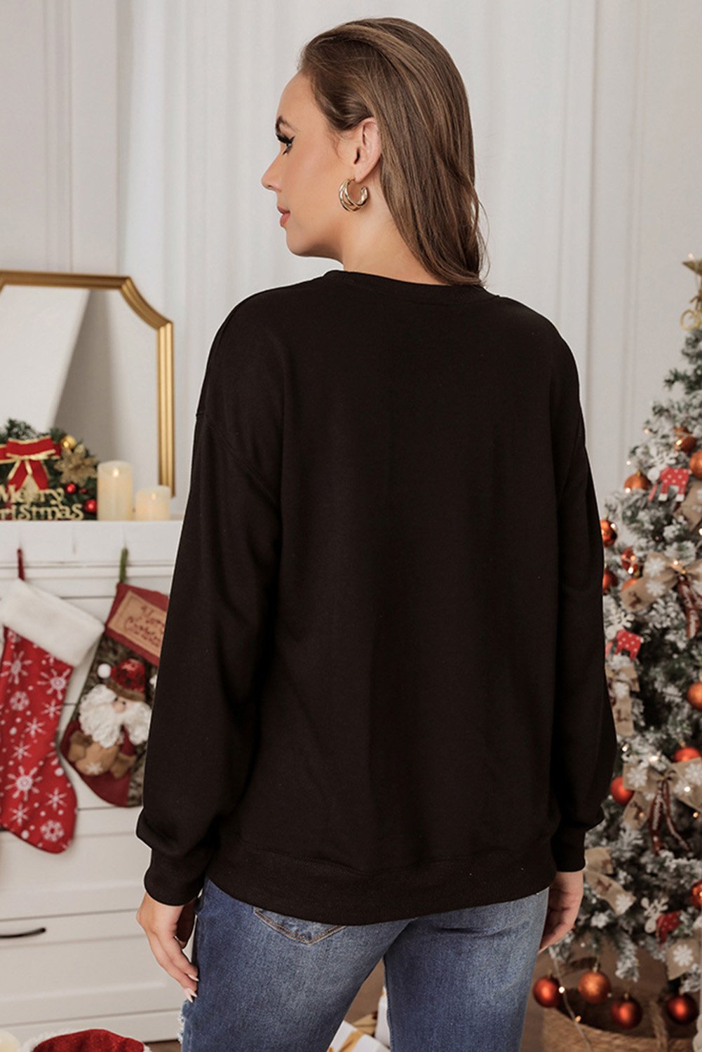 A cozy Christmas Long Sleeve Sweatshirt featuring festive patterns and a round neckline, perfect for autumn and winter wear.