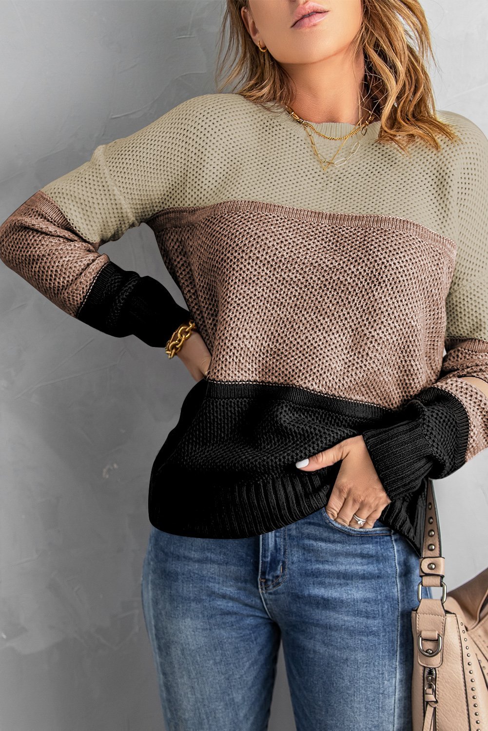 A stylish khaki color block pullover sweater for women, featuring full sleeves and a comfortable knit material.