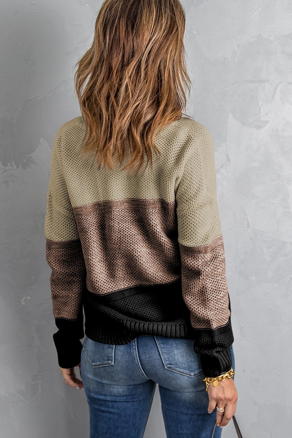 A stylish khaki color block pullover sweater for women, featuring full sleeves and a comfortable knit material.