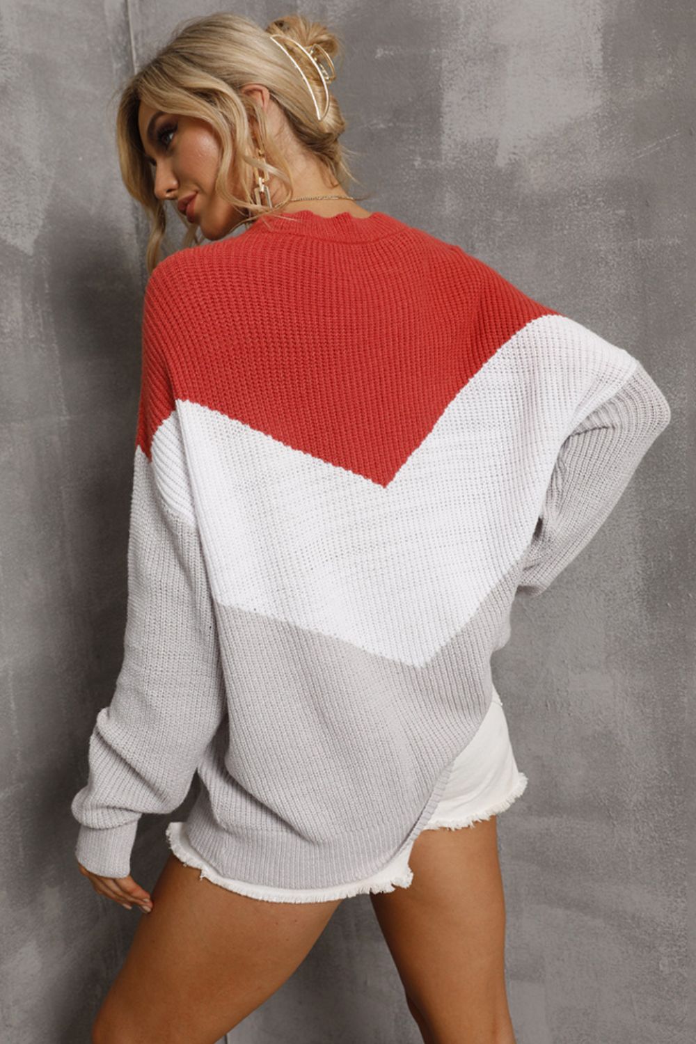 Color Block Round Neck Rib-Knit Sweater featuring a stylish design with long dolman sleeves and a cozy ribbed texture.