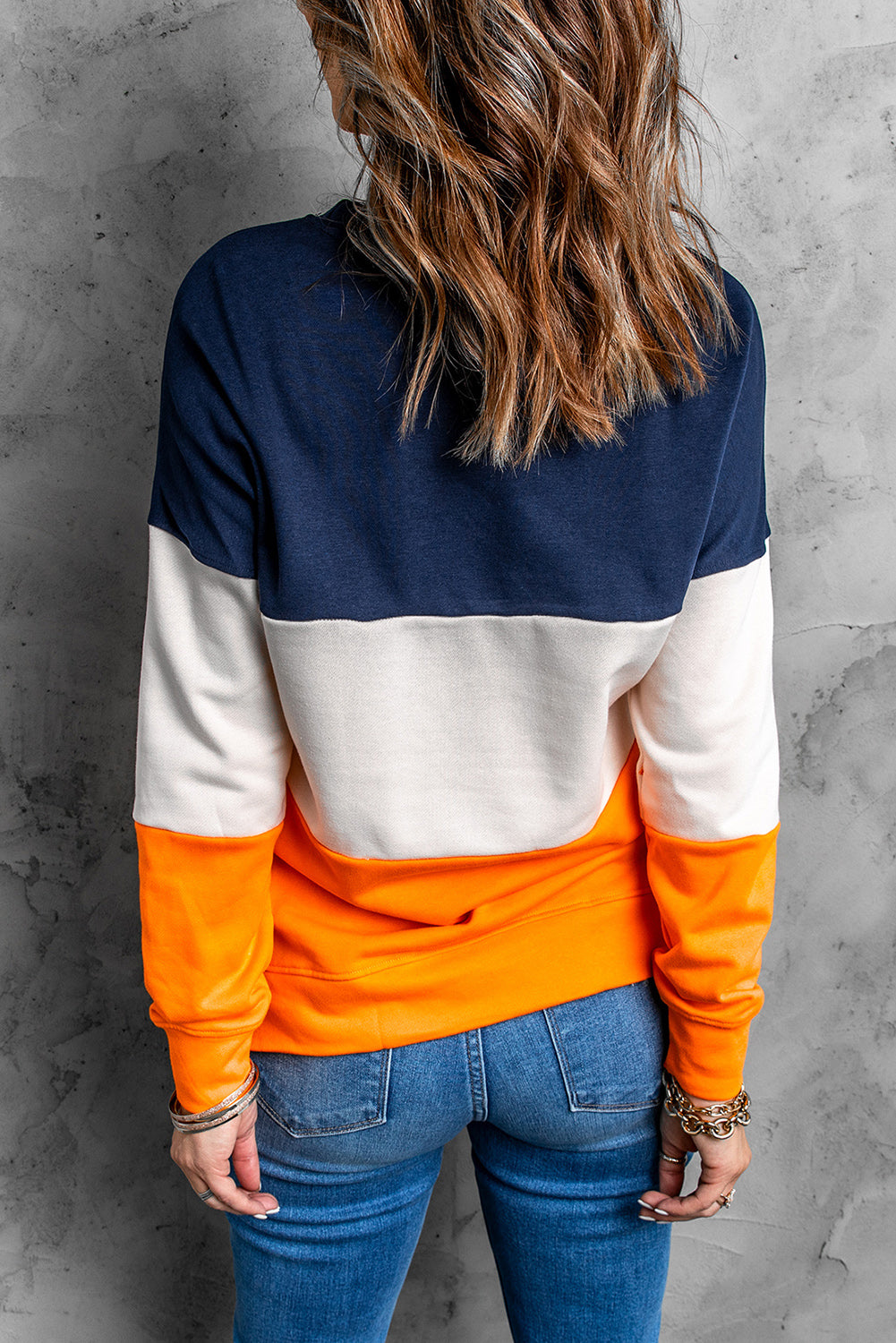 Colorblock Orange Sweatshirt featuring a trendy design with long sleeves and a round neckline, perfect for casual wear.