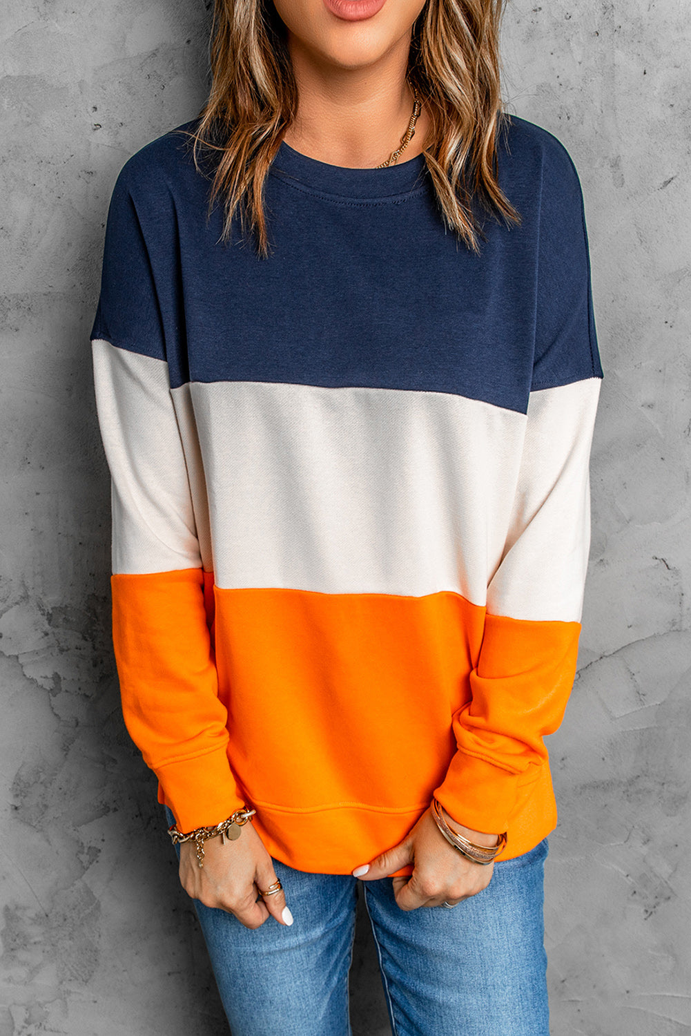 Colorblock Orange Sweatshirt featuring a trendy design with long sleeves and a round neckline, perfect for casual wear.