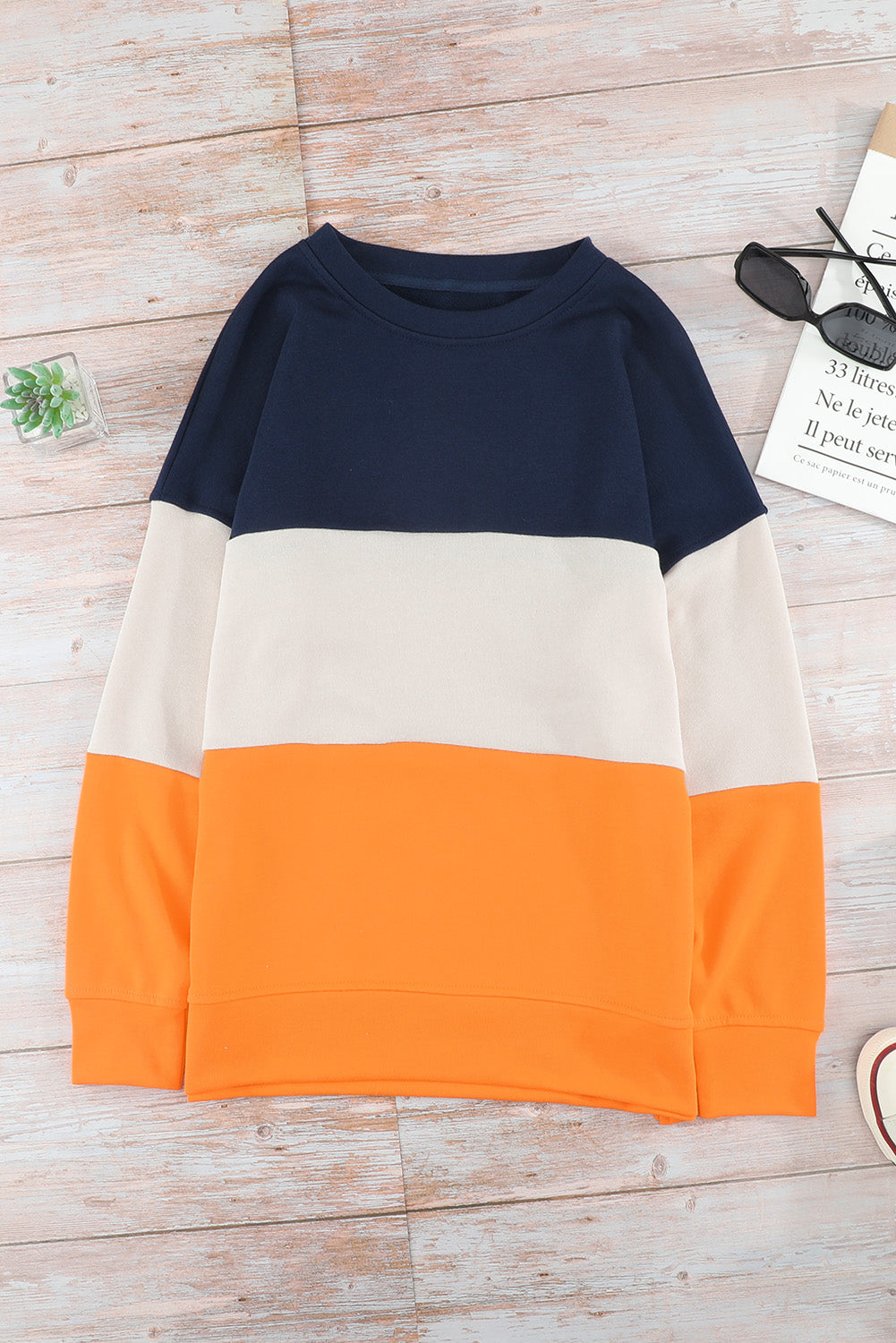 Colorblock Orange Sweatshirt featuring a trendy design with long sleeves and a round neckline, perfect for casual wear.