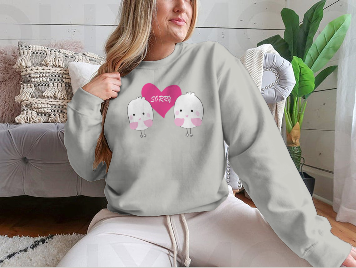 Cute bird design with a red heart and the word 'Sorry' on a comfortable shirt.