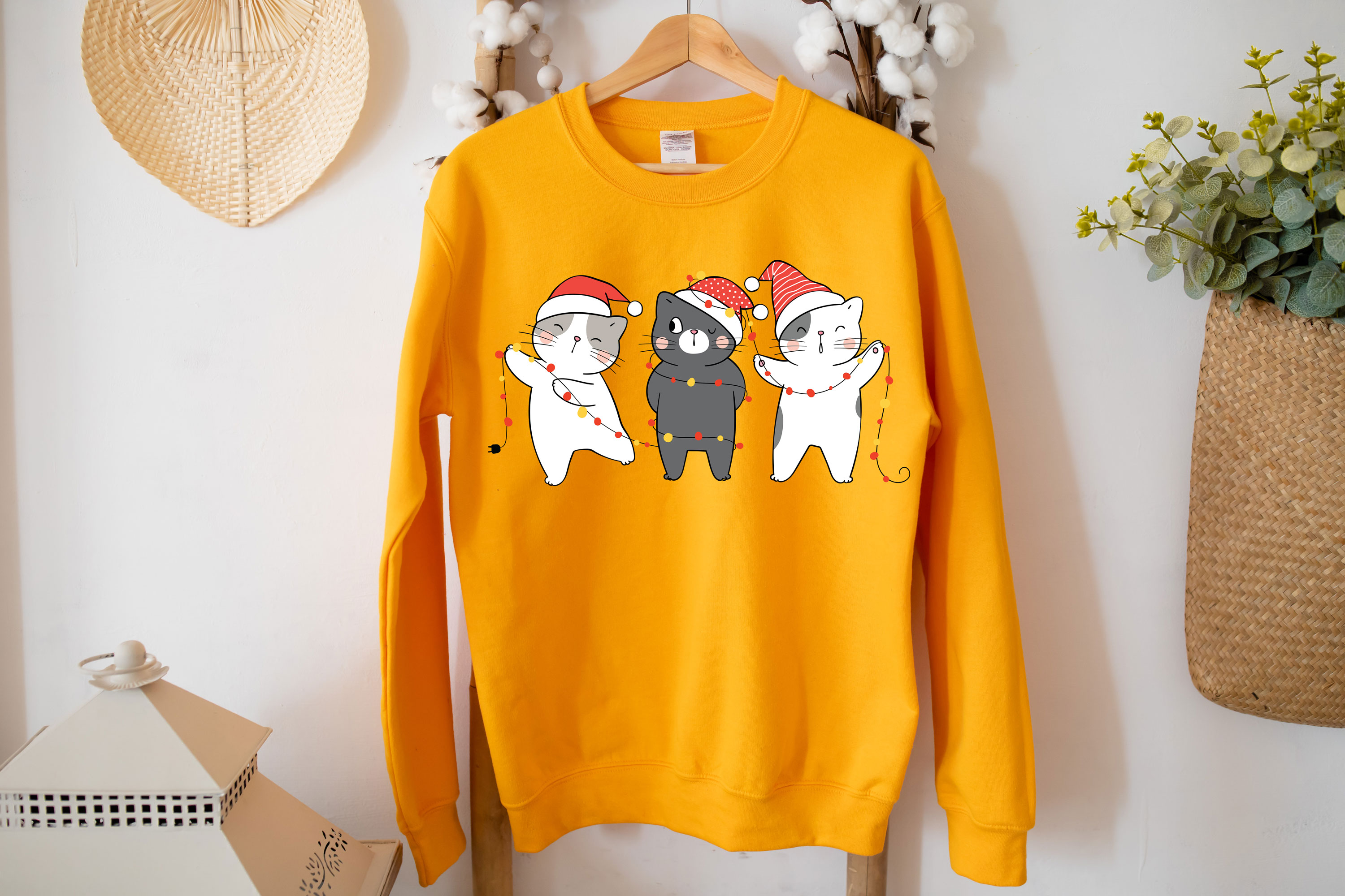 Cute Cats Christmas Sweatshirt featuring playful cat designs, perfect for holiday celebrations.