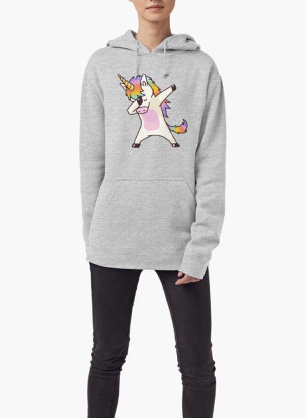 Person wearing unicorn graphic hoodie.