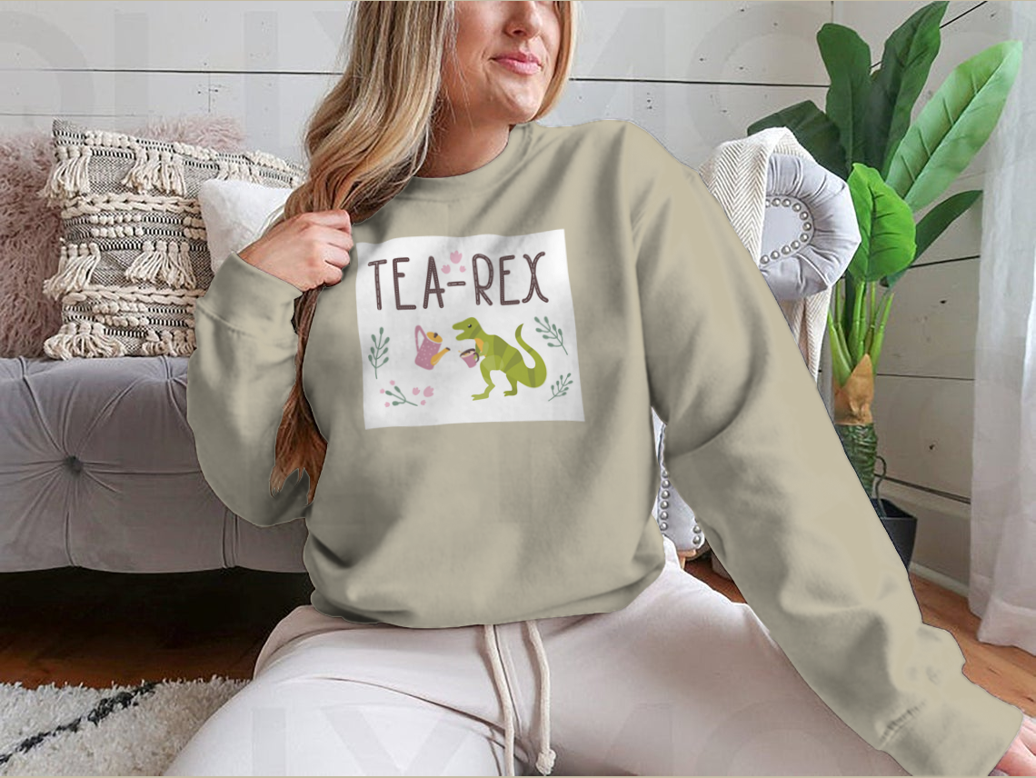 Dino Quote Tea Rex design featuring a Tyrannosaurus with a cup and kettle, showcasing a playful and unique style.