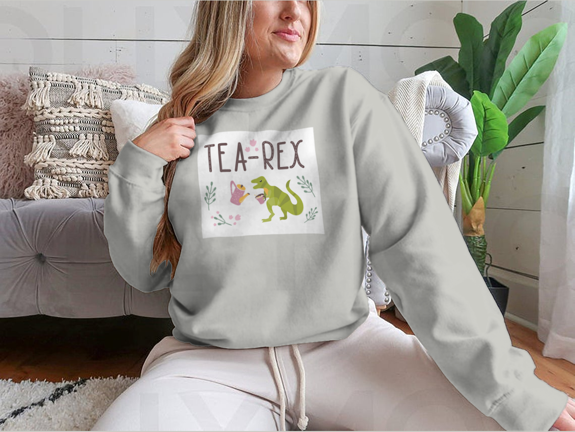 Dino Quote Tea Rex design featuring a Tyrannosaurus with a cup and kettle, showcasing a playful and unique style.