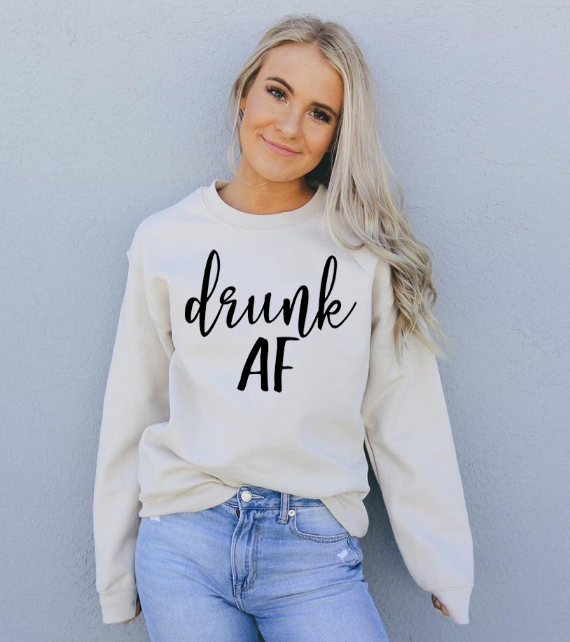 Drunk AF Sweatshirt in a cozy unisex design, featuring a crew neck and soft fabric blend.