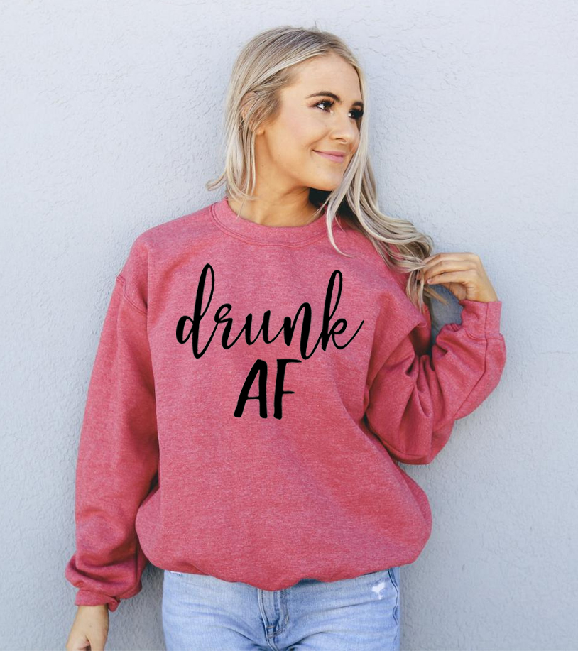 Drunk AF Sweatshirt in a cozy unisex design, featuring a crew neck and soft fabric blend.