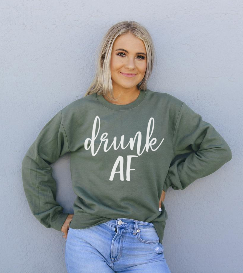 Drunk AF Sweatshirt in a cozy unisex design, featuring a crew neck and soft fabric blend.