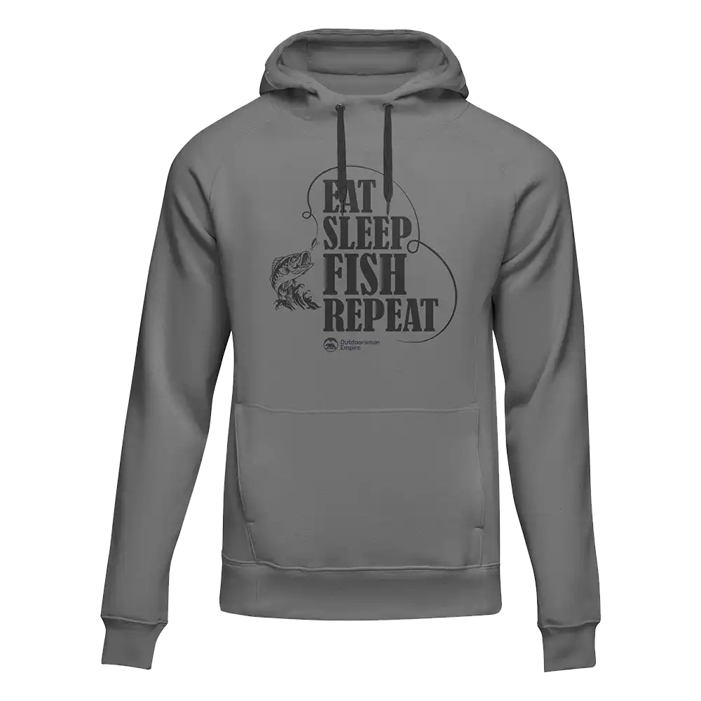 A cozy unisex hoodie featuring the phrase 'Eat Sleep Fish Repeat' in a stylish design, perfect for fishing enthusiasts.