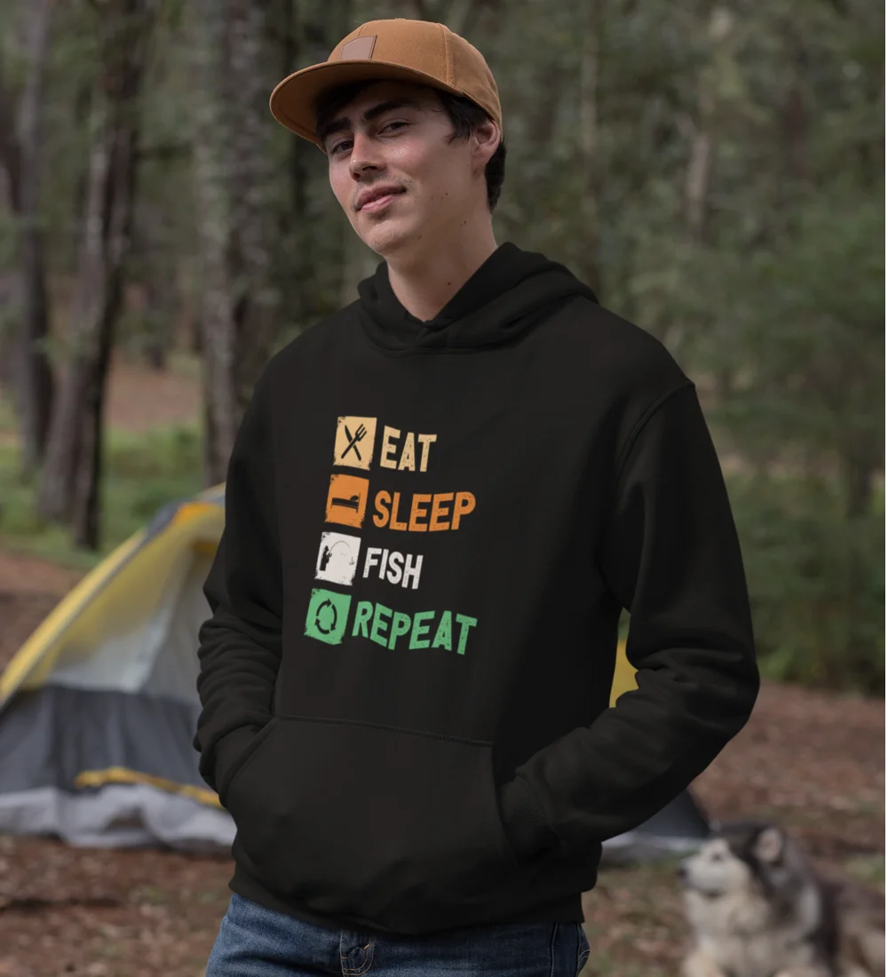 A cozy unisex hoodie featuring the phrase 'Eat Sleep Fishing Repeat' in a stylish font, perfect for fishing enthusiasts.