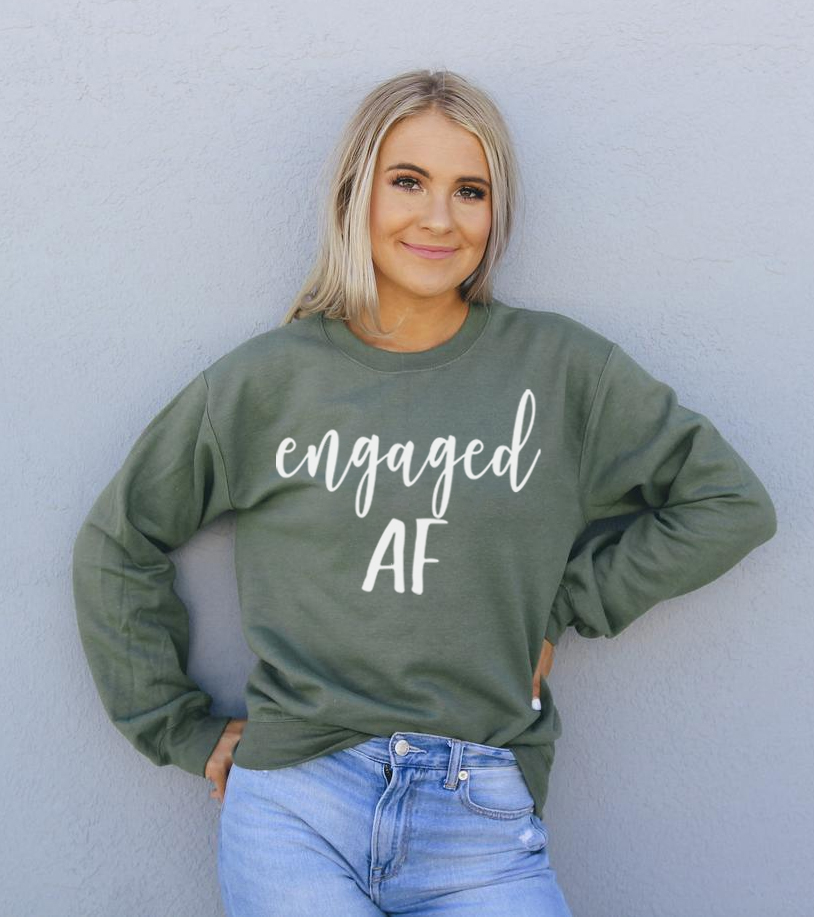 Engaged AF Sweatshirt in a cozy unisex design, featuring a crew neck and soft fabric blend.