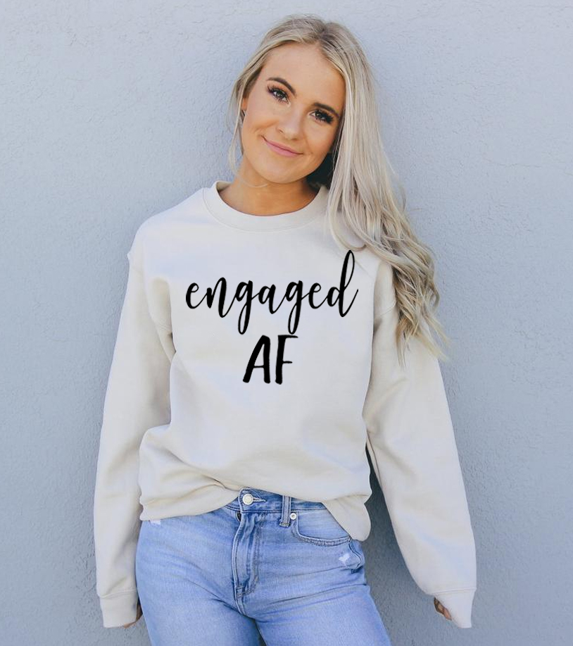 Engaged AF Sweatshirt in a cozy unisex design, featuring a crew neck and soft fabric blend.