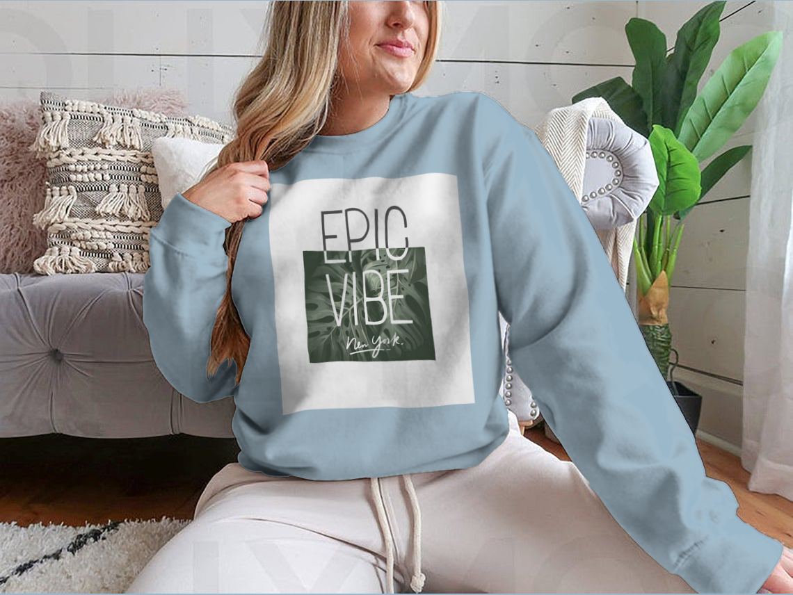 Epic Vibe Slogan T-shirt featuring a colorful tropical leaf background, made from 100% cotton for comfort and style.