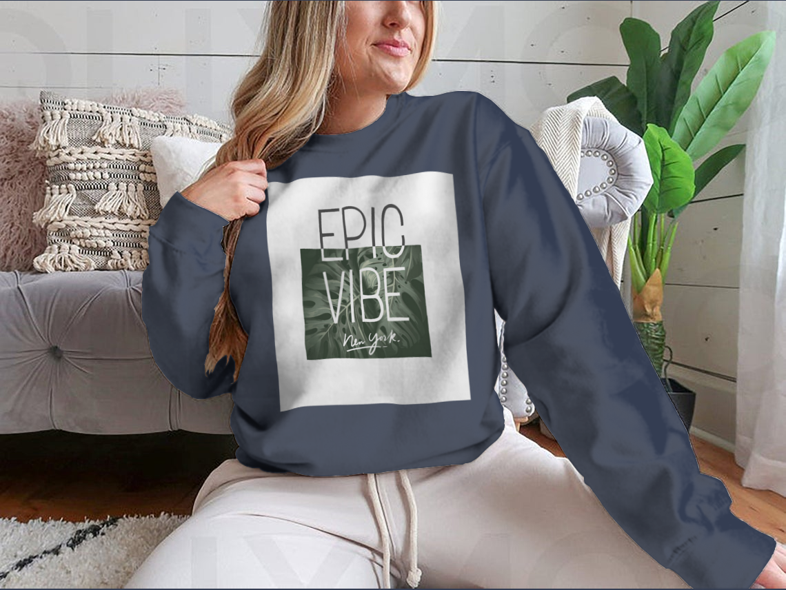 Epic Vibe Slogan T-shirt featuring a colorful tropical leaf background, made from 100% cotton for comfort and style.