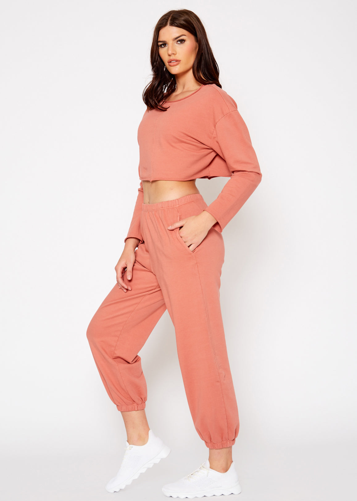 Essential French Terry Sweatpants in Rose with side slit pockets, showcasing a relaxed fit and natural dye.