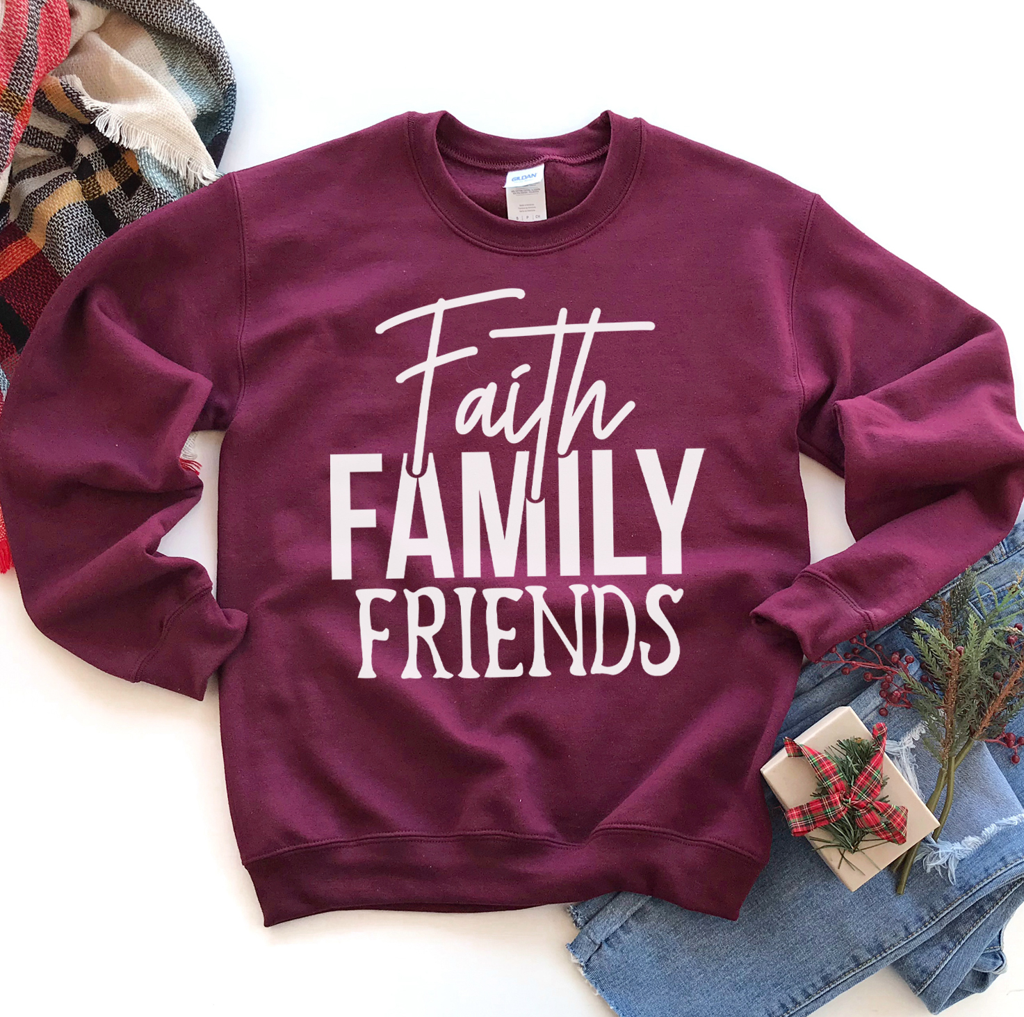 A cozy unisex sweatshirt featuring the phrase 'Faith Family Friends' in stylish lettering, perfect for casual wear.