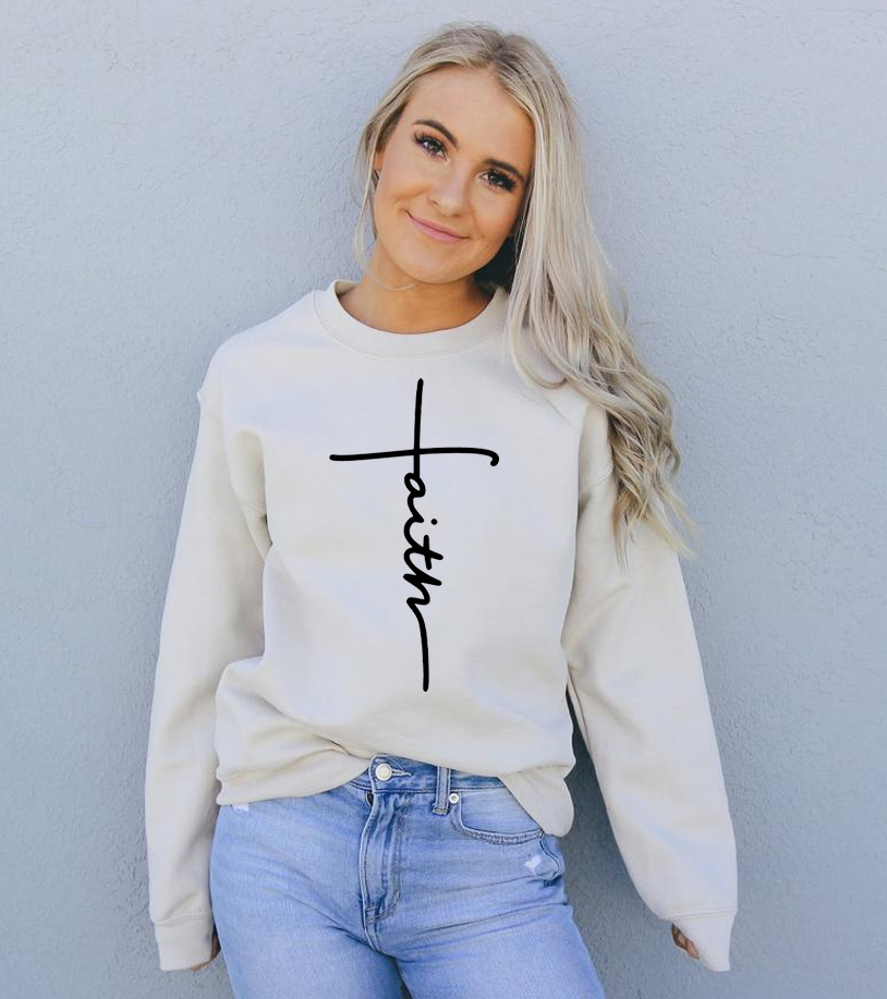 A cozy unisex Faith Sweatshirt featuring a crew neck and soft fabric, perfect for casual wear.