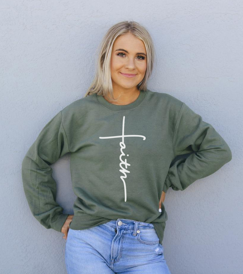 A cozy unisex Faith Sweatshirt featuring a crew neck and soft fabric, perfect for casual wear.