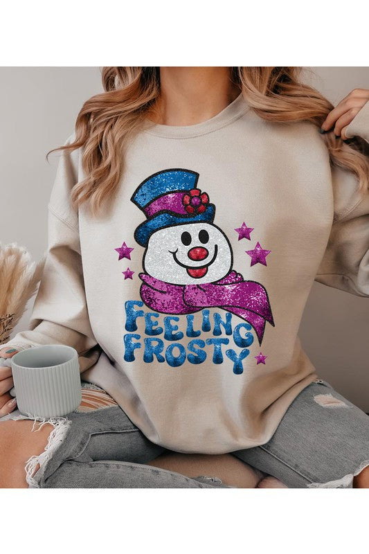 Feeling Frosty Fleece Sweatshirt featuring a festive design, oversized fit, and long sleeves, made from a soft cotton-polyester blend.