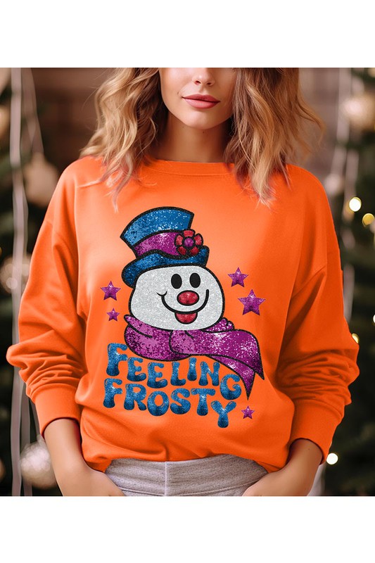 Feeling Frosty Fleece Sweatshirt featuring a festive design, oversized fit, and long sleeves, made from a soft cotton-polyester blend.