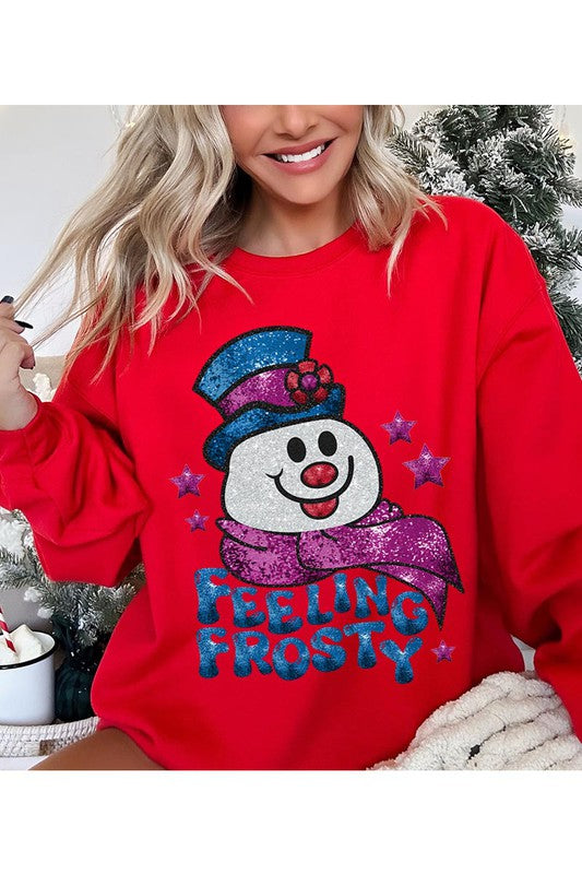 Feeling Frosty Fleece Sweatshirt featuring a festive design, oversized fit, and long sleeves, made from a soft cotton-polyester blend.