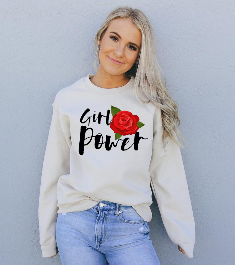 A cozy unisex sweatshirt featuring the empowering 'Girl Power' graphic, made from soft fabric with a classic crew neck design.