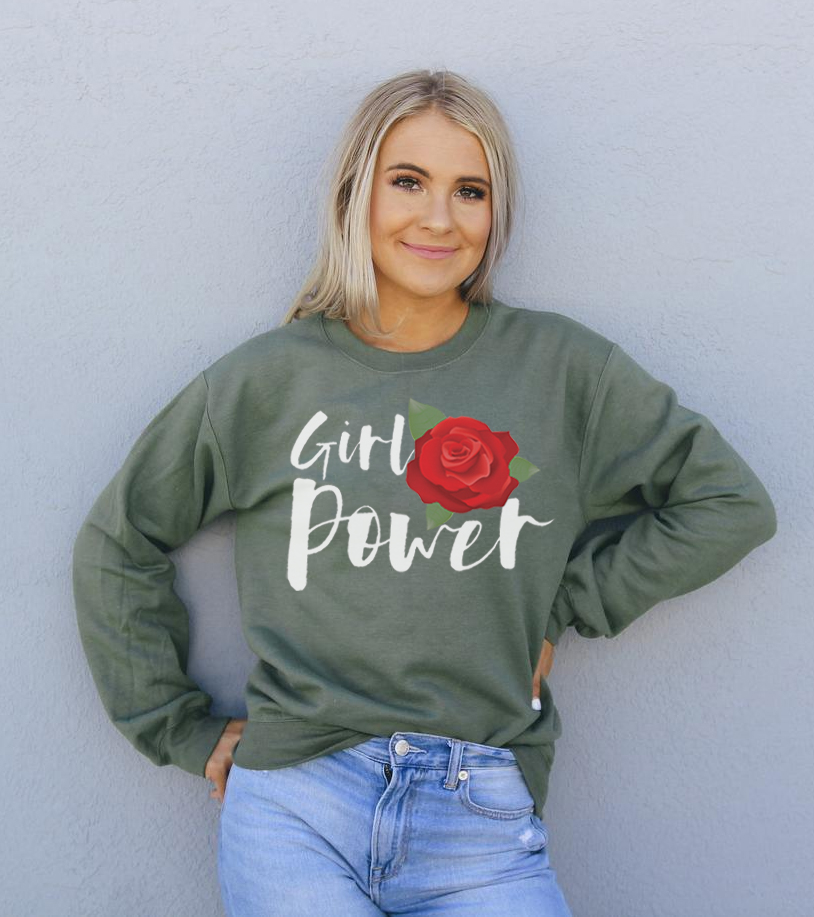 A cozy unisex sweatshirt featuring the empowering 'Girl Power' graphic, made from soft fabric with a classic crew neck design.