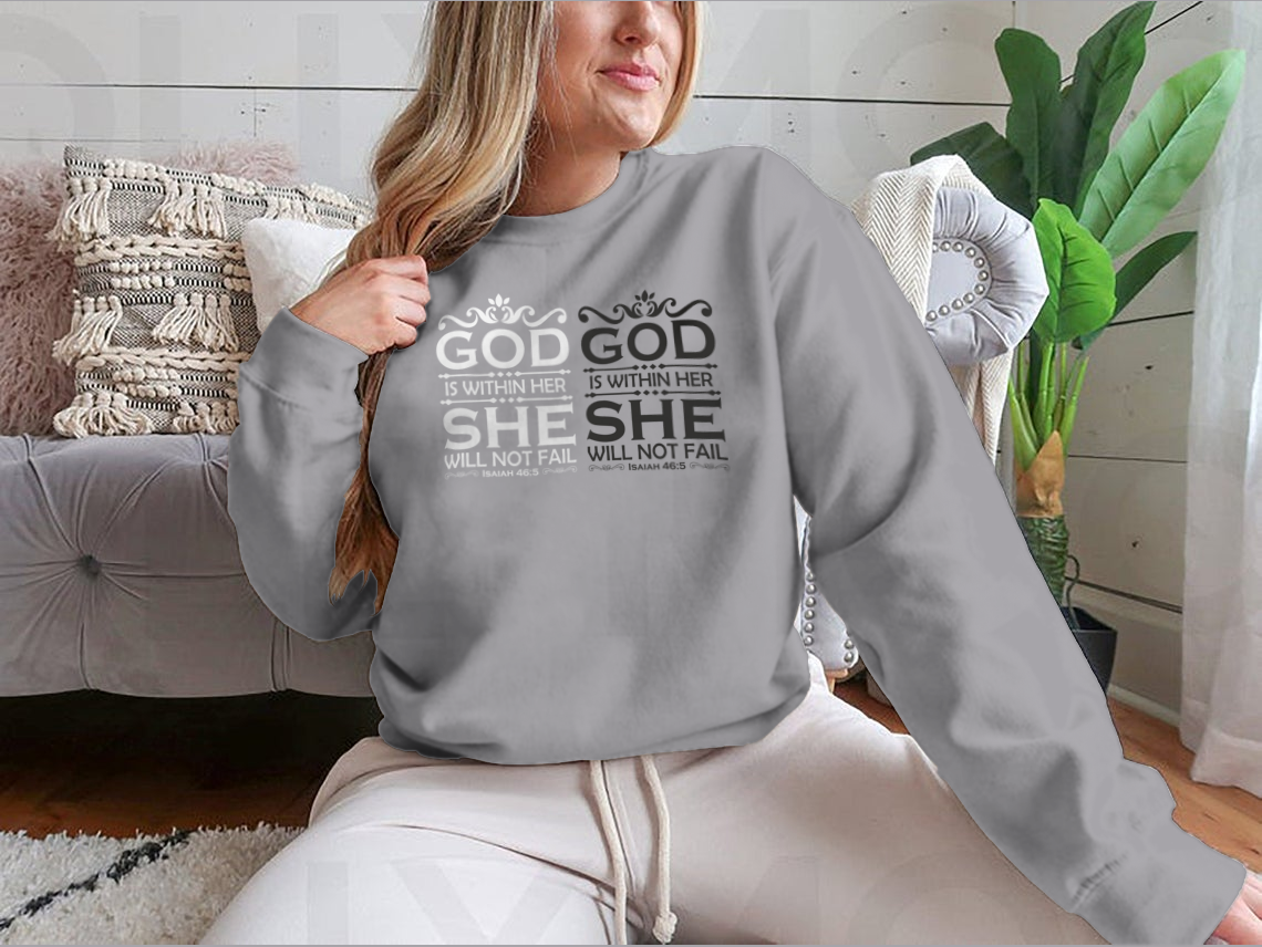 A stylish Christian cross shirt featuring the phrase 'God Is Within Her She Will Not Fail', made from soft cotton fabric.