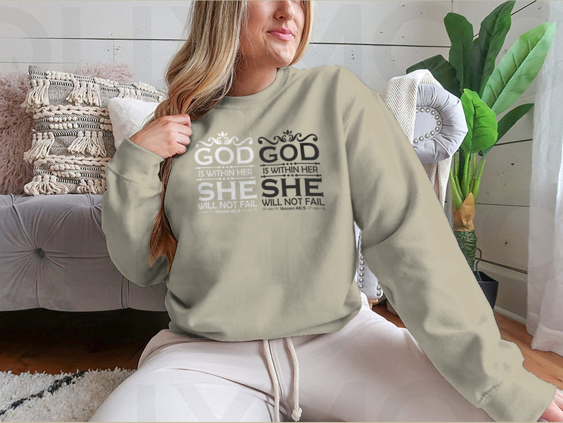 A stylish Christian cross shirt featuring the phrase 'God Is Within Her She Will Not Fail', made from soft cotton fabric.