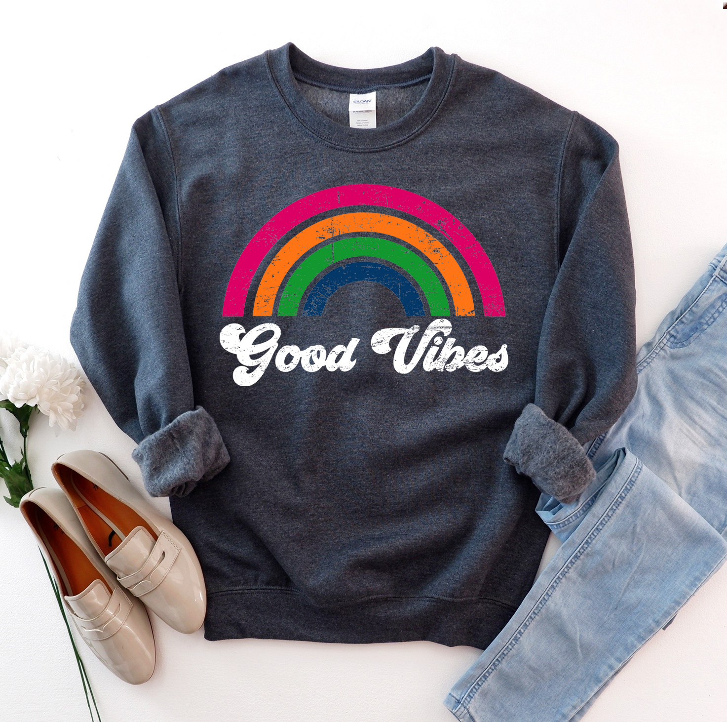 A cozy unisex Good Vibes Sweatshirt in a stylish design, featuring a crew neck and rib-knit collar, perfect for casual wear.