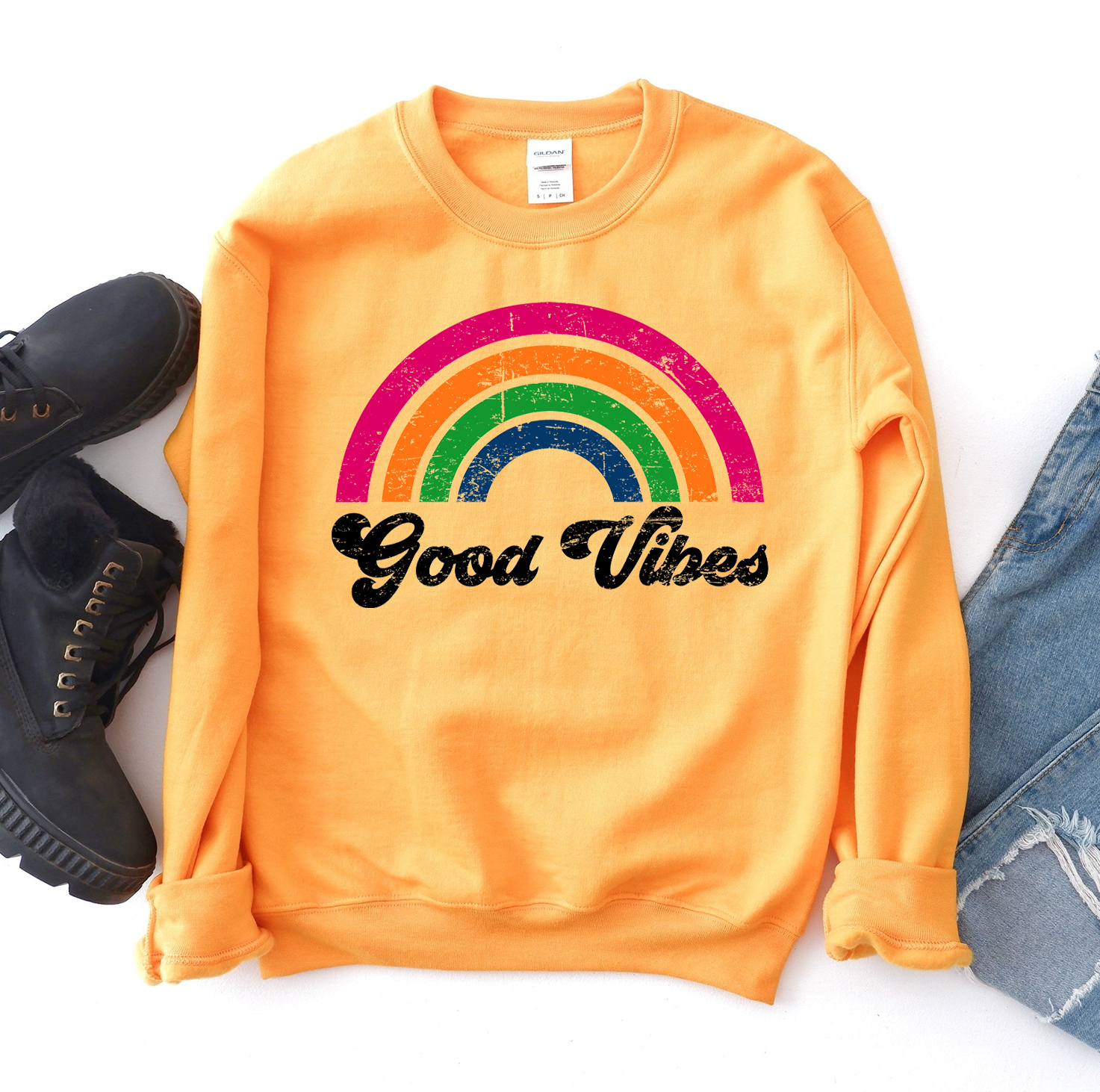 A cozy unisex Good Vibes Sweatshirt in a stylish design, featuring a crew neck and rib-knit collar, perfect for casual wear.