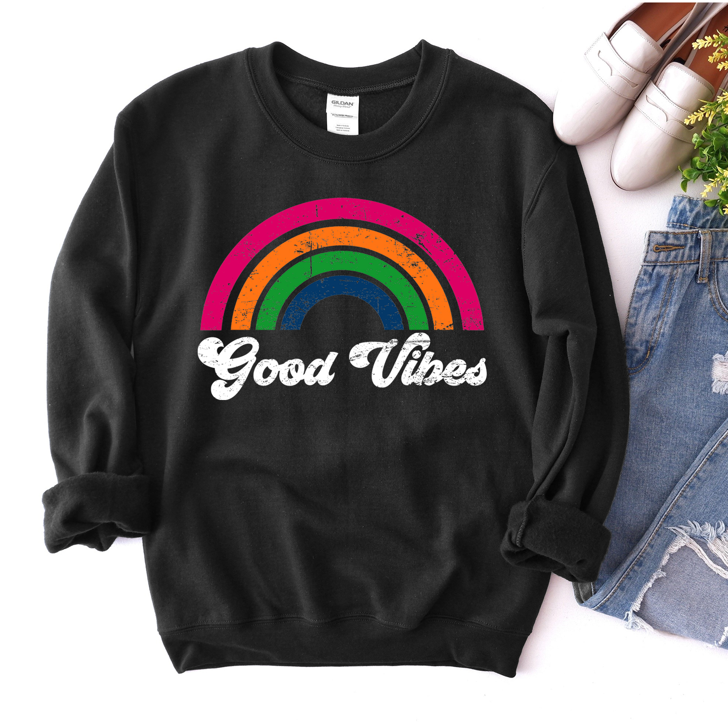 A cozy unisex Good Vibes Sweatshirt in a stylish design, featuring a crew neck and rib-knit collar, perfect for casual wear.