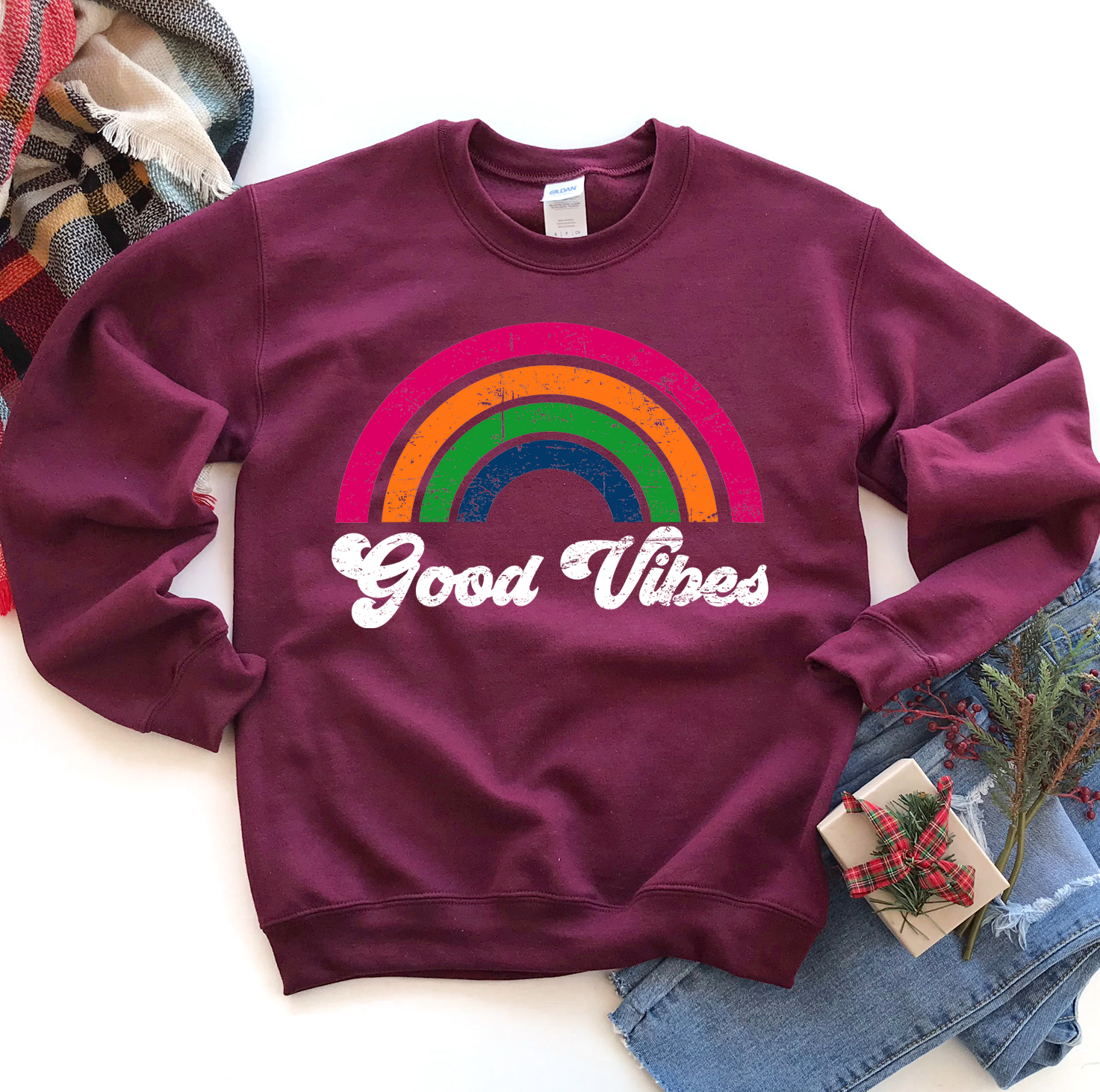 A cozy unisex Good Vibes Sweatshirt in a stylish design, featuring a crew neck and rib-knit collar, perfect for casual wear.