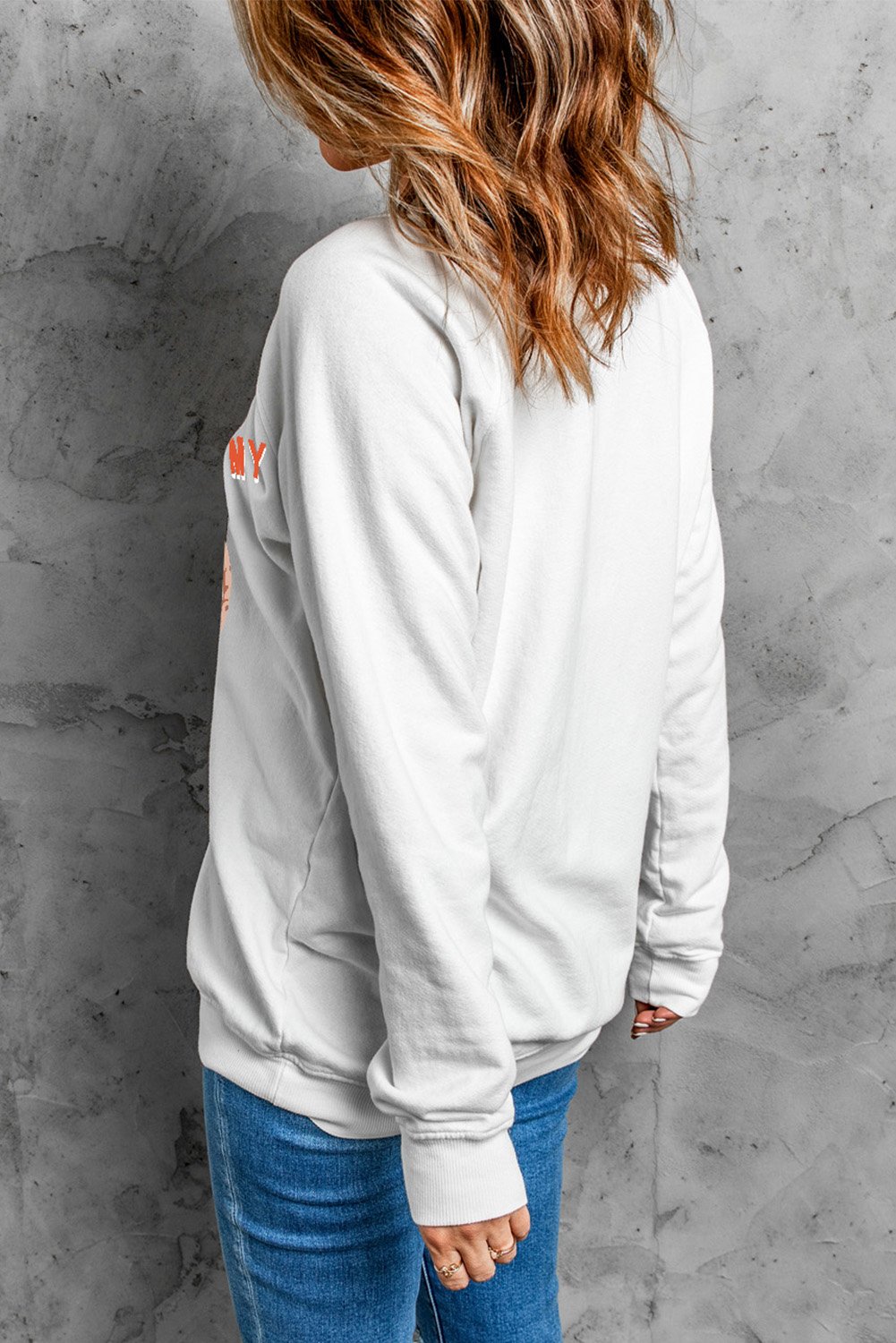 A stylish white Graphic Print Sweatshirt featuring a trendy graphic design, perfect for casual wear during fall and winter.