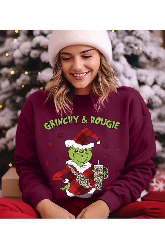 GRINCHY & BOUGIE fleece sweatshirt featuring a festive graphic design, round neck, and long sleeves, perfect for casual winter wear.