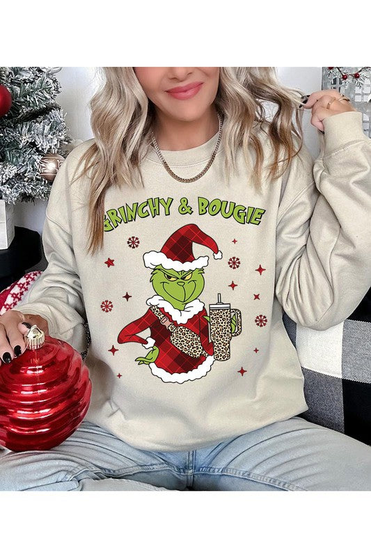 GRINCHY & BOUGIE fleece sweatshirt featuring a festive graphic design, round neck, and long sleeves, perfect for casual winter wear.