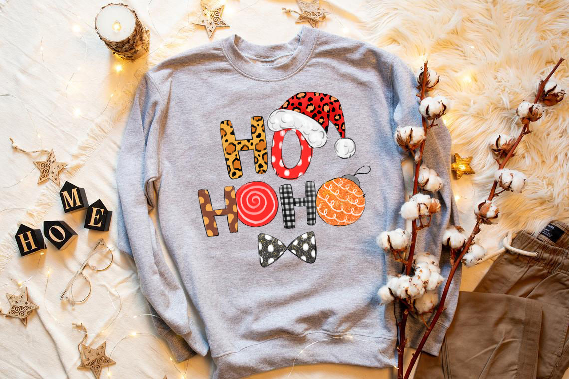 A cozy Gildan crewneck sweatshirt featuring a festive HO HO HO Santa Cap design, perfect for Christmas celebrations.