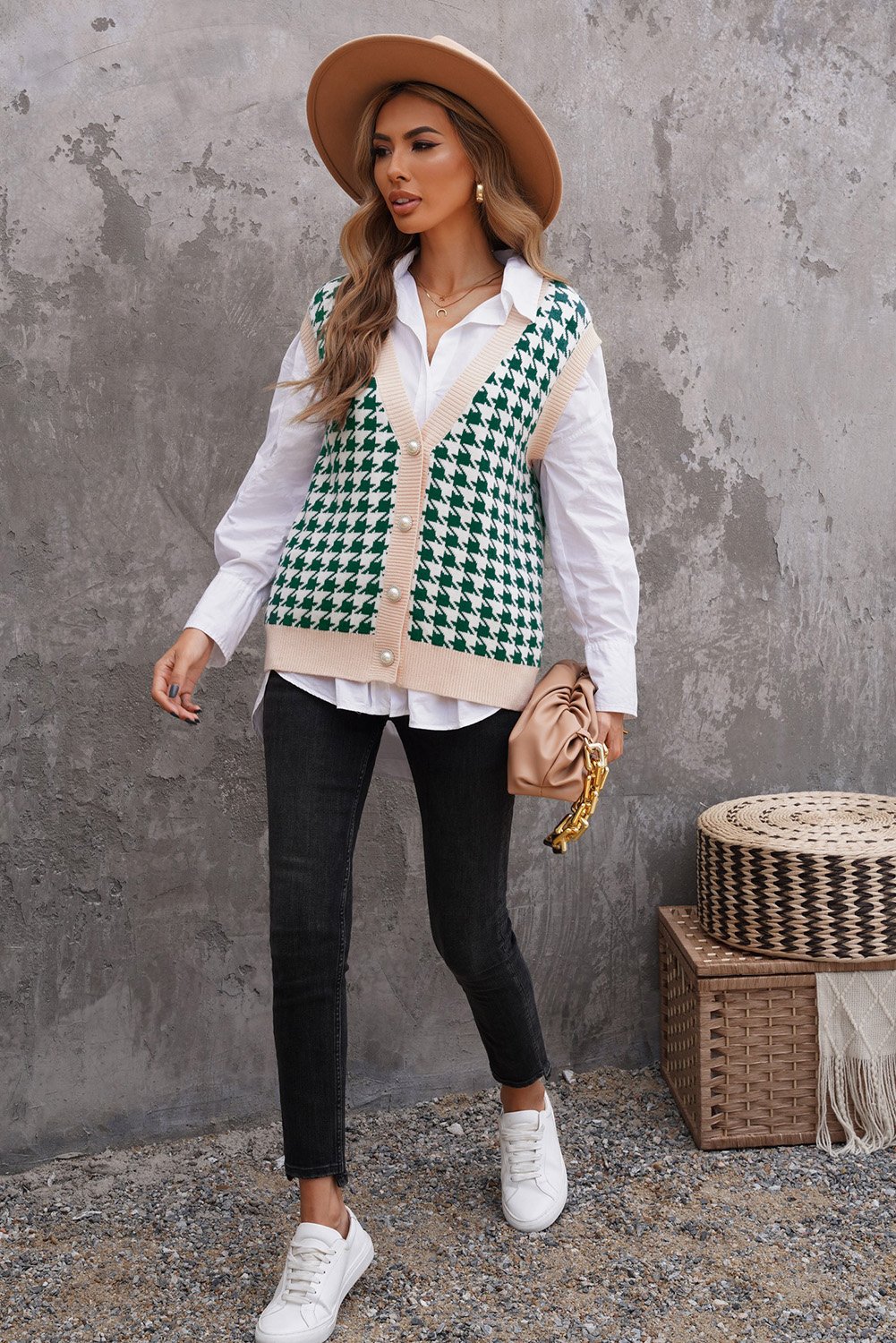 A stylish Houndstooth Vest Cardigan featuring a timeless pattern, button closure, and sleeveless design, available in black, green, and pink.