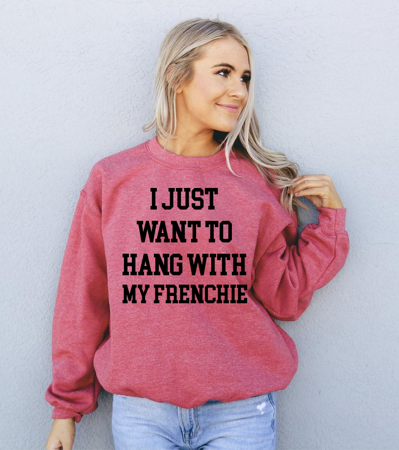 A cozy unisex sweatshirt featuring the phrase 'I Just Want To Hang With My Frenchie', perfect for dog lovers.