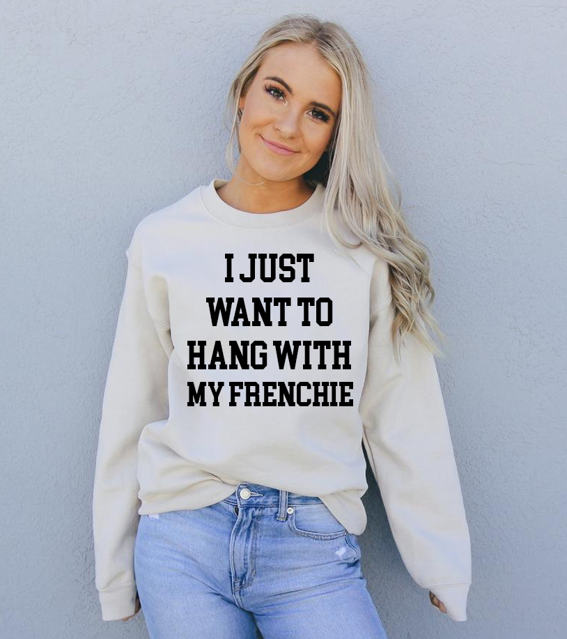 A cozy unisex sweatshirt featuring the phrase 'I Just Want To Hang With My Frenchie', perfect for dog lovers.