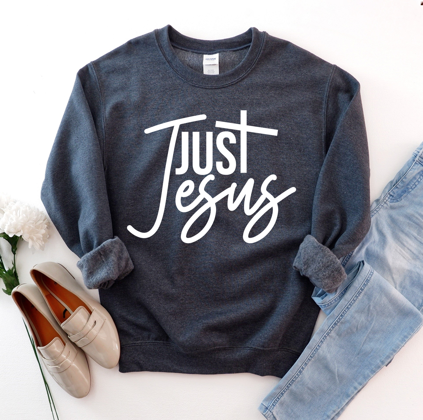 A cozy unisex Just Jesus Sweatshirt featuring a classic crew neck design, made from soft fabric blend, perfect for casual wear.