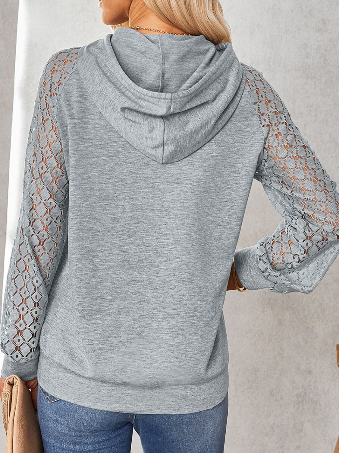 Lace Raglan Sleeve Drawstring Detail Hoodie displayed on a ghost mannequin, showcasing its stylish design and long sleeves.